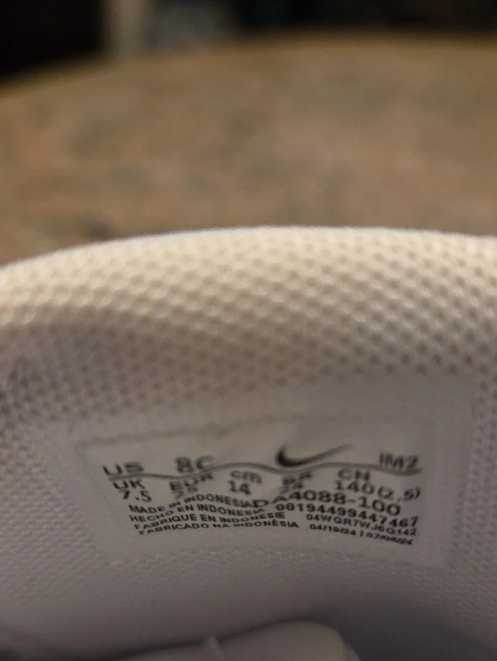 Nike Kids White High-Top Sneakers with Black Swoosh